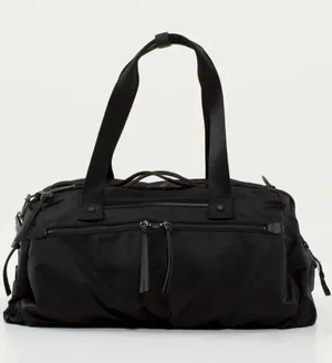 Lululemon Black Work It Out Duffel with Blue Floral Lining thumbnail 1
