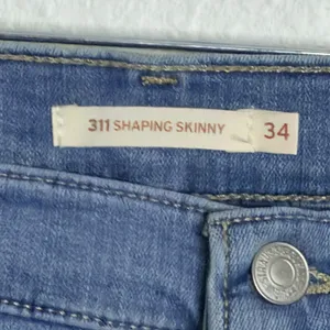 Levi's 311 Shaping Skinny Sz 34 Medium Wash Blue Stretch Denim Jeans Classic thumbnail 3