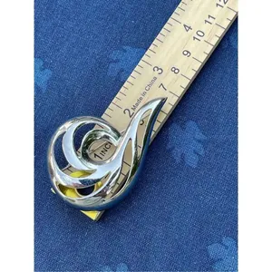 Vintage shiny Monet swirl brooch. Large thumbnail 3