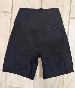 High-Rise Black Women's Bike Shorts with Subtle Logo thumbnail 1