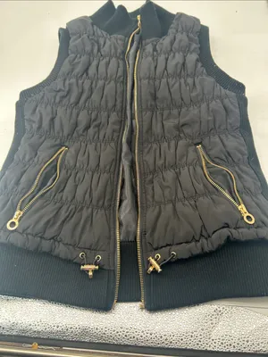 Calvin Klein Women’s Black Quilted Puffer Vest with Gold Accents bust bust 32 length 23 thumbnail 6