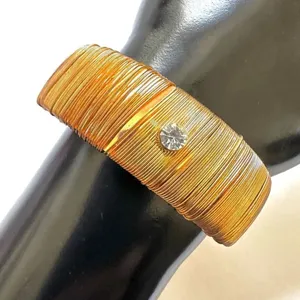 Gold tone wire wrapped bangle bracelet thumbnail 2