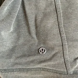 Lululemon olive green asymmetrical zip up thumbnail 5