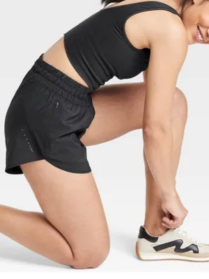 all in motion black mid rise run shorts thumbnail 1