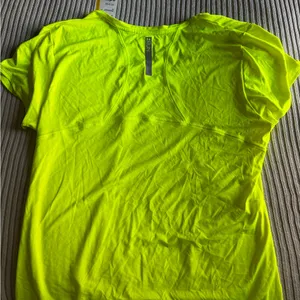 Under Armour Women's Neon Yellow Short Sleeve Tee thumbnail 1