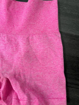 Comfortable high-waist seamless shorts in vibrant pink. Soft, stretchy fabric for unrestricted movement. Smooth waistband provides a flattering, secure fit. Ideal for workouts, yoga, or everyday wear. Size small thumbnail 2