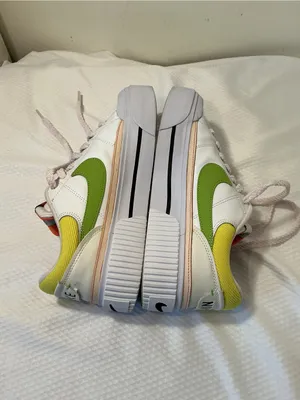 Nike White Low-Top Sneakers with Orange Tongue and Subtle Pink Lining thumbnail 6