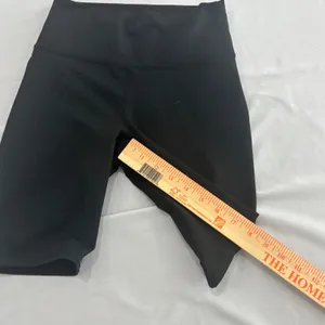 Fabletics PowerHold Black High Waisted Biker Shorts with Pockets Womens thumbnail 6