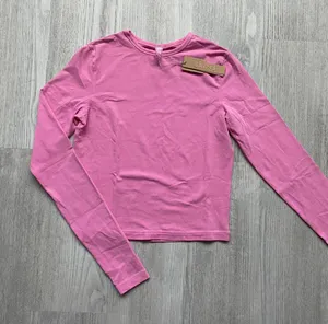 SKIMS New Vintage Cropped Long Sleeve T-shirt In Limited Edition 🍬BUBBLEGUM🍬 thumbnail 1
