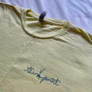 pastel yellow and blue Notre Dame knitting club shirt thumbnail 6