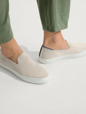 Rothy's Men's Slip-On Knit Sneakers in Beige with Navy Heel Detail thumbnail 1