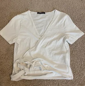 Brandy Melville white wrap top thumbnail 1