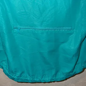 ASICS running raincoat packable lightweight water / wind resistant thumbnail 7