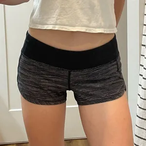 Lululemon Speed Shorts in Heathered Black / Grey thumbnail 1