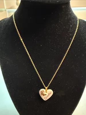Source Unknown Gold-Tone Chain with White Heart Pendant and Butterfly Detail thumbnail 2