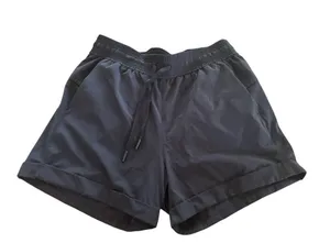 Lululemon On the Fly Shorts Black Sz 6 Cuffed Drawstring Running Athletic Pocket thumbnail 1