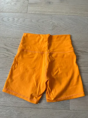 Orange OFFLINE by Aerie Biker Shorts thumbnail 2