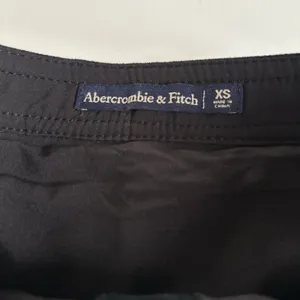 Abercrombie & Fitch Black Faux Suede Button Up A-Line Mini Skirt Women’s XS thumbnail 2