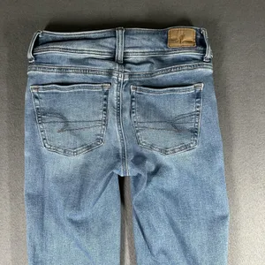 American Eagle Kick Boot Jeans Womens 000 Short Blue Wash Next Level Stretch thumbnail 14