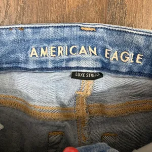 American Eagle Luxe Stretch Hi-Rise Distressed/Ripped Light Wash Jegging Jeans thumbnail 2