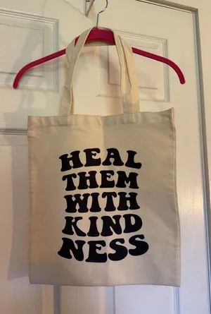 Handcrafted Canvas Tote Bag with "Heal Them With Kindness" Print thumbnail 1
