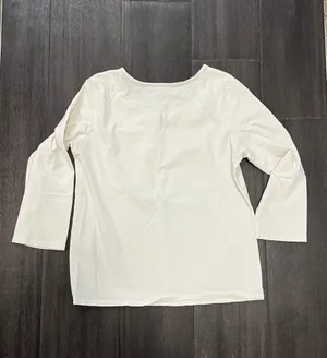Soft cream long sleeve top with a modest scoop neckline. Features a small decorative ring keyhole at center front. Lightweight, easy to layer for casual or office wear. Simple, clean silhouette for versatile styling. J, Jill size medium. 95% cotton 5% spandex thumbnail 5