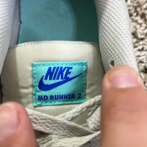 Women’s Nike MD runner 2, size 10 sneakers…grey and green thumbnail 3
