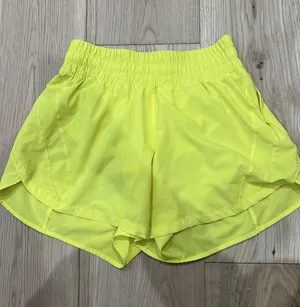 Lululemon hotty hot shorts neon yellow I believe they are 4’ thumbnail 1