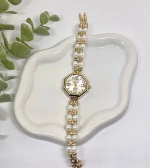 Dainty Gold Tone Pearl Watch thumbnail 1