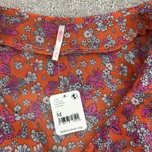 NEW NWT Free People nina printed top in tulip ditsy orange floral bell sleeve thumbnail 7