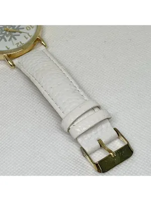 Gold tone women’s watch snowflake dial 40mm quartz analog white leather running thumbnail 4