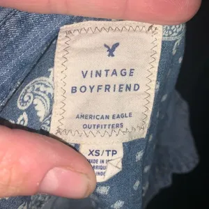American Eagle light wash denim boyfriend fit XS button down shirt thumbnail 3