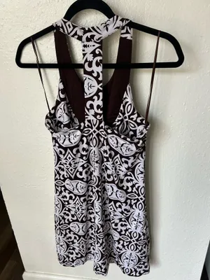 FashionY2K #Retro #chic style INC International Concepts Beaded Halter #Geometric #Damask Dress - Size M Design: Beautiful geometric/damask print in dark brown and white tones. Neckline: Spectacular halter neck, completely decorated by hand with fine rhinestones, white / gold beads and crystal applications that shine beautifully. Material: Soft and elastic fabric of excellent quality (92% Polyester, 8% Spandex) that fits the body very well without losing comfort. Garment condition: Used in excellent physical condition, without labels. Transparency note: It has a minimal detail on one side of the strap where a few pearls were unstitwned (see last detail photo), however, it is practically imperceptible when used and does not affect the general aesthetics or structure of the dress at all. The rest of the central rhinestones are intact. Ready for immediate shipment! Give this beautiful piece a second life. Combine thumbnail 3