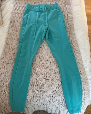 XS Teal Alo tie leggings thumbnail 1