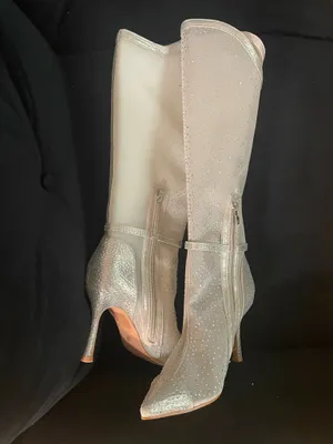 Studio Infinite Elegant silver knee-high boots with all-over rhinestone embellishments. Sleek zip closure and ankle strap for a secure fit. Shiny & sheer silver finish adds a glamorous touch to evening looks. Size 7.5W thumbnail 2