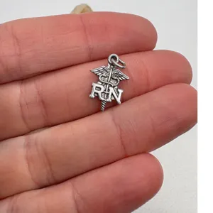 Vintage Sterling Silver‎ RN Nurse Caduceus Charm Pendant Medical Jewelry 0.81g thumbnail 2