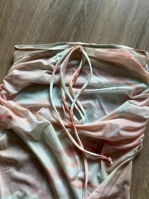 Pastel tie-dye bikini set (top, bottom, coverup) with pink, peach, and light blu thumbnail 3