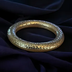 Gold tone hammered round bangle bracelet thumbnail 1