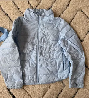 Sweaty Betty light blue puffer jacket thumbnail 1