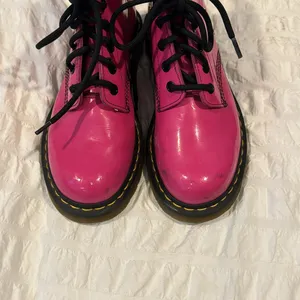Dr. Marten’s 1460 Smooth Leather Lace Up Boots in Pink thumbnail 9