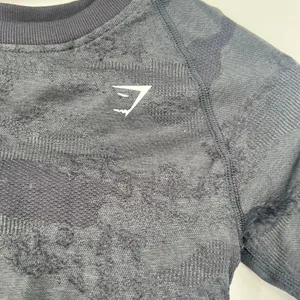 Gymshark Adapt lace up open back Seamless long sleeve crop top in black size XS thumbnail 7