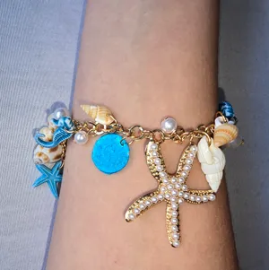 Ocean-Themed Charm Bracelet‎ with Blue and Gold Color Accents thumbnail 9