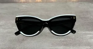 Boutique White and black sunglasses thumbnail 4