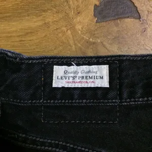 Levi’s 501 raw hem black buttonfly shorts 27 thumbnail 10