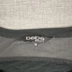 Bebe Sport T-Shirt Womens M Black V-Neck Short Sleeve Sheer Jersey Logo Top thumbnail 3