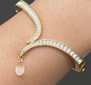 SWAROVSKI Vintage Signed Gold-tone Hinged V Bangle With Teardrop Crystal Charm thumbnail 3