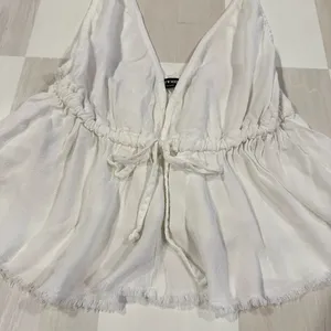 brandy melville riley babydoll flowy white tank top thumbnail 4