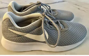 Nike Women’s Gray + White Sneakers thumbnail 1