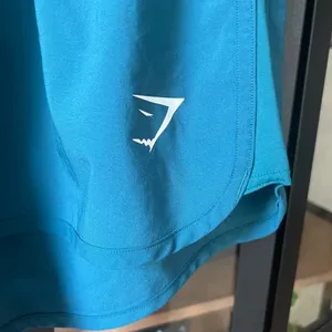 Gymshark Running Shorts athletic band teal green blue workout flowy stretchy low thumbnail 2