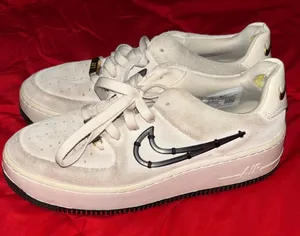 Nike Women's Cream and Black Sneakers thumbnail 1
